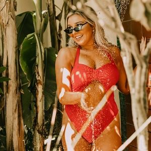 Red swimsuit with cut out back and tie top